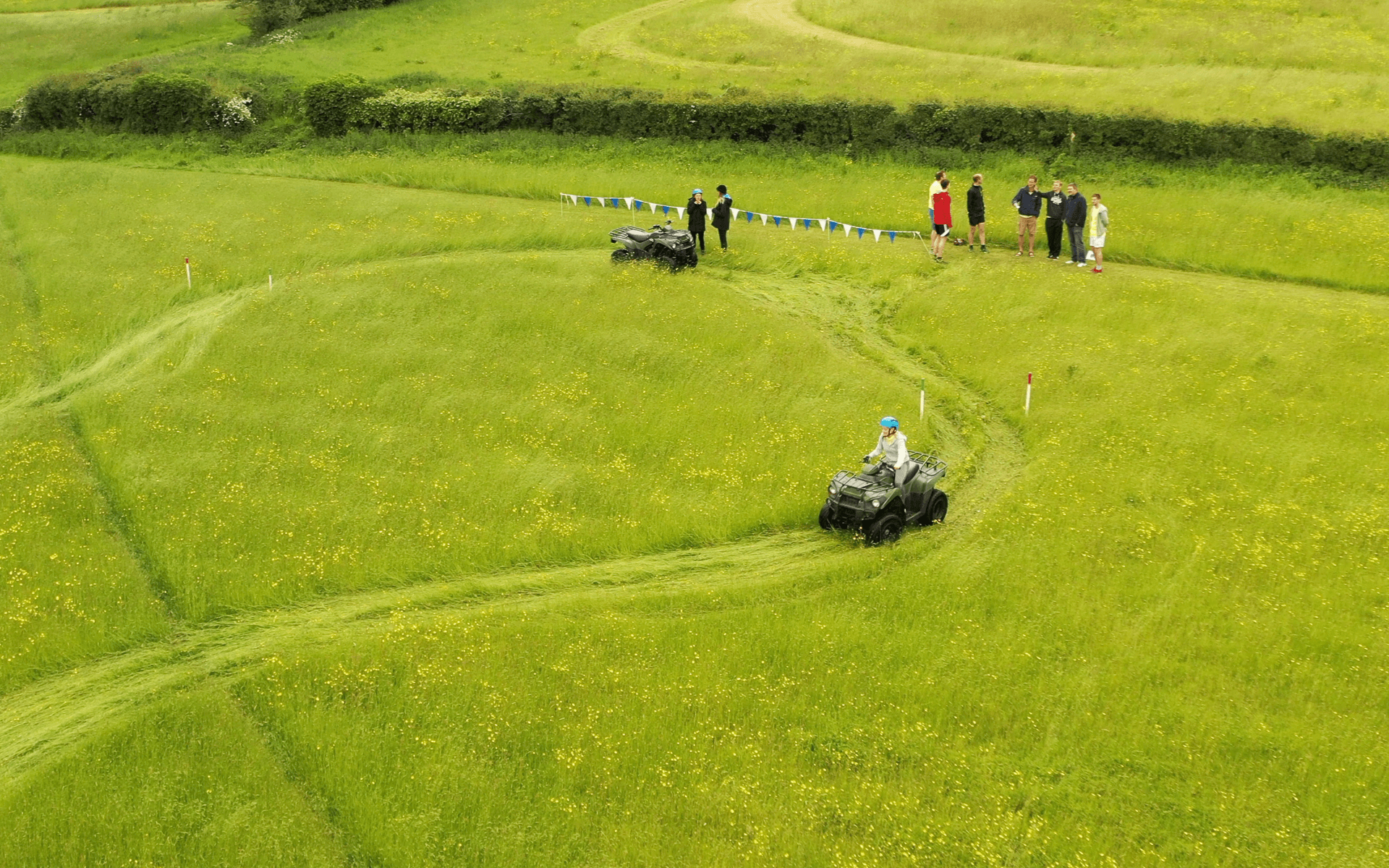 "DJI Mavic 2 Pro" aerial drone photo of "Hydrock" employee on a quadbike in a field at corporate event in almondsbury bristol